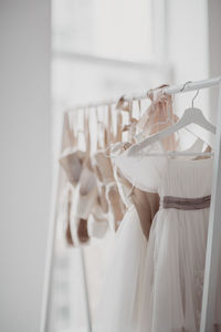 Close-up of clothes hanging on rack