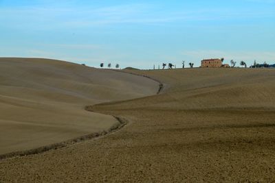 Scenic view of desert against sky