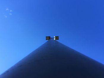 Low angle view of built structure against clear blue sky