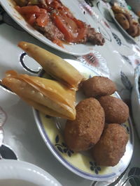 High angle view of meat in plate on table