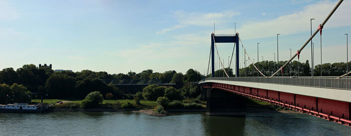 Bridge over river against sky