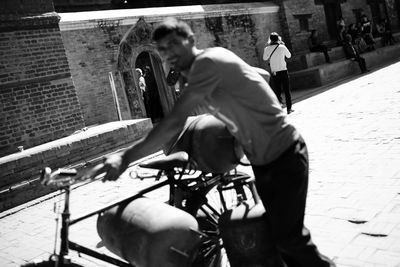 High angle view of man with bicycle