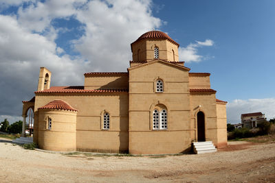 Exterior of historic building against sky