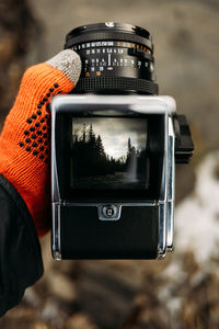 Looking down at viewfinder of vintage hasselblad 500cm camera.