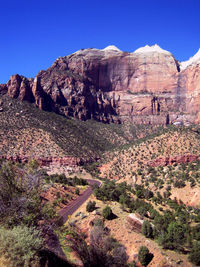 Scenic view of landscape against clear blue sky