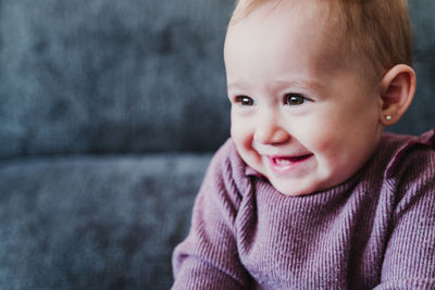 Cute baby girl at home