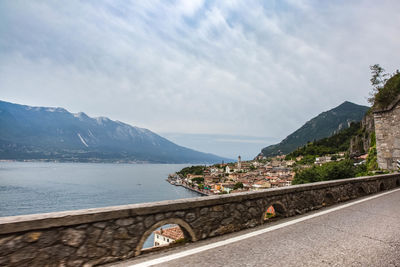 Scenic view of mountains against sky at lake garda italy