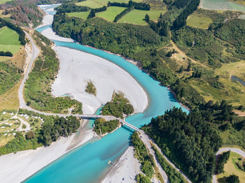 Aerial view of river flowing on landscape