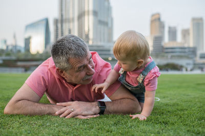 Father and daughter looking at each other