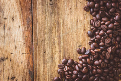 Directly above shot of roasted coffee beans on table