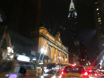 Light trails on city street at night