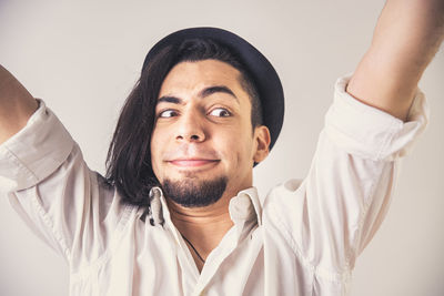 Close-up portrait of smiling young man