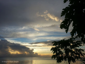 Scenic view of sea against sky at sunset