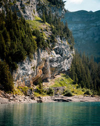 Scenic view of sea against mountain