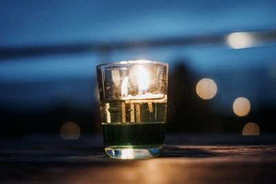 Close-up of wine glass on table