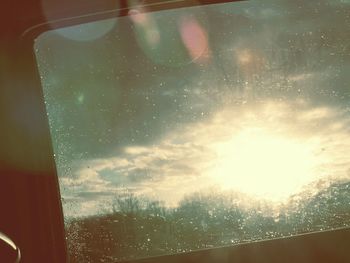 Sunset seen through glass window