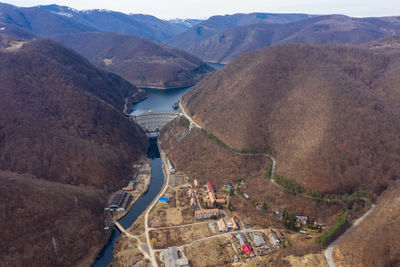 Aerial view of a hydroelectric plant and dam, weir, tarnita lake reservoir, romania