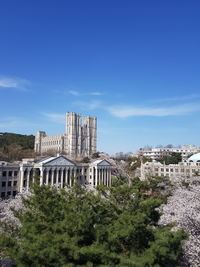 Buildings against blue sky