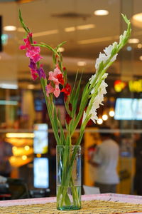 Close-up of flower vase on table