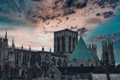 Panoramic view of buildings against sky during sunset