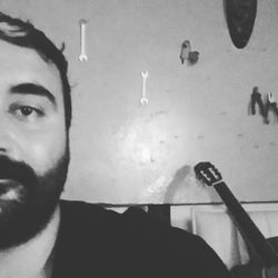 Close-up of man smoking cigarette