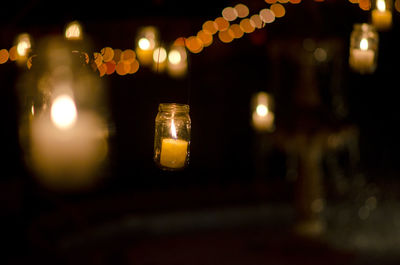 Close-up of illuminated lights at night