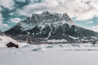 Panoramic view of the zugspitze and ehrwald in winter.