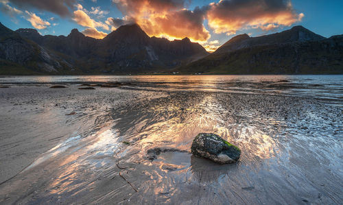 Scenic view of lake against sky during sunset