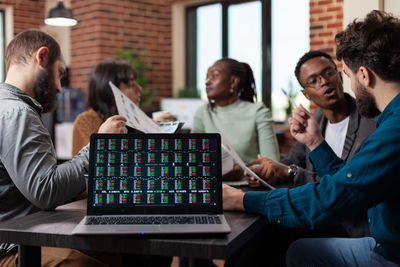 Business colleagues working at office