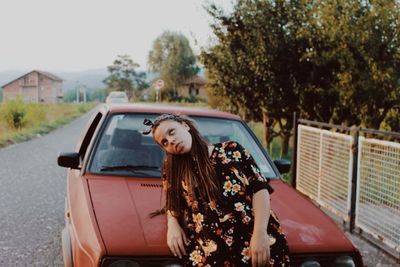 Woman sitting in car