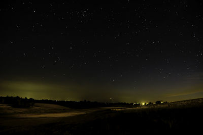 Scenic view of star field against sky at night