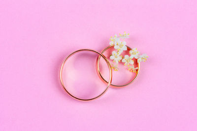 High angle view of pink flower on table