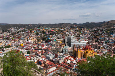 High angle shot of townscape against sky