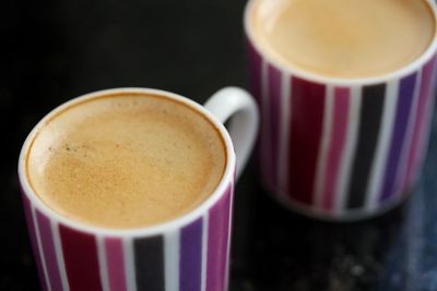 Close-up of coffee cup on table