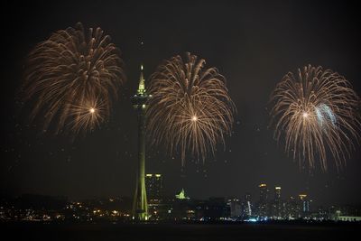 Firework display at night