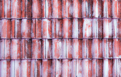 The old red tile on the roof