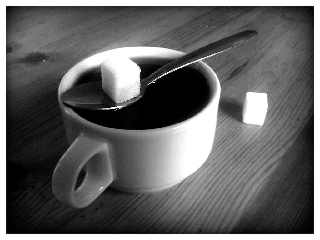 transfer print, indoors, auto post production filter, still life, table, close-up, coffee cup, high angle view, wood - material, food and drink, spoon, cup, no people, refreshment, coffee, coffee - drink, drink, empty, directly above, saucer