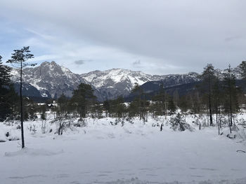 Scenic view of snowcapped mountains against sky