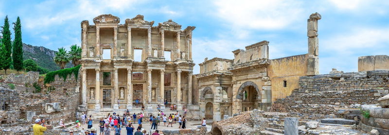 Group of people in front of historical building