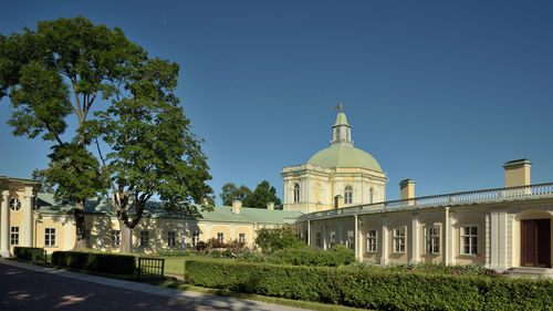 View of historic building against clear blue sky