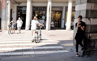 People on street in city