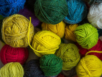 Colorful balls of woolen yarn