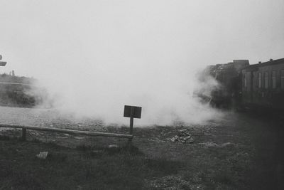 Road amidst buildings against sky in city