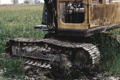 Abandoned truck on field