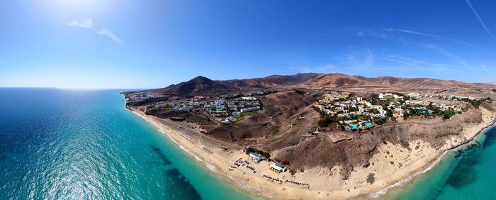 High angle view of beach against blue sky