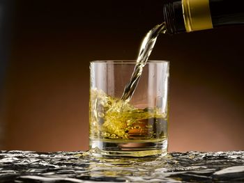 Close-up of beer glass on table
