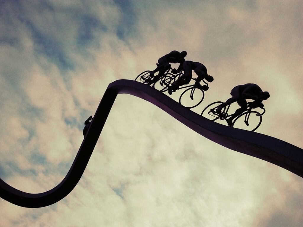 sky, low angle view, silhouette, cloud - sky, sunset, bicycle, cloudy, transportation, cloud, mode of transport, dusk, outdoors, street light, no people, nature, metal, weather, sport, lighting equipment, land vehicle