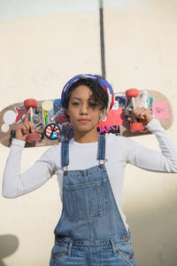 A young woman on a skateboard