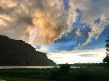 Scenic view of landscape against sky during sunset