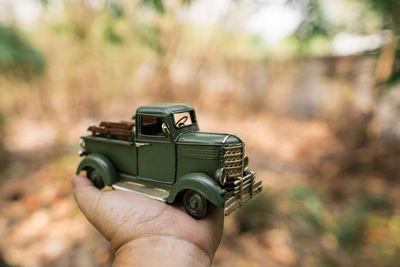 Close-up of hand holding camera